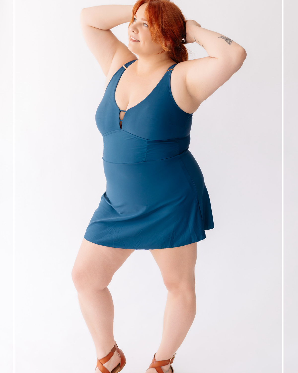 Woman wearing a blue dress against a white background | Model Photo - Rachel | Harlow + James Boutique | West Des Moines, IA