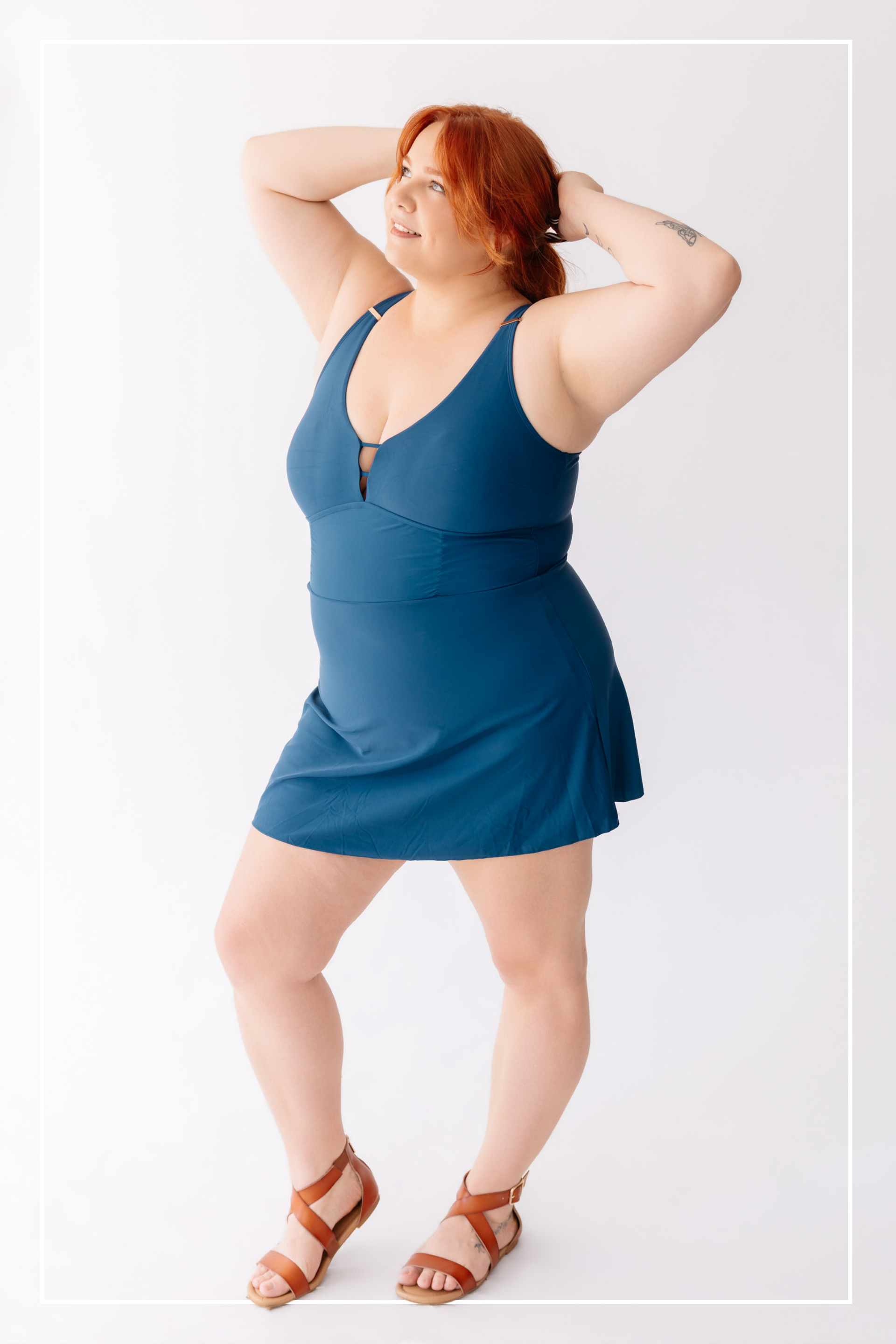 Woman wearing a blue dress against a white background | Model Photo - Rachel | Harlow + James Boutique | West Des Moines, IA
