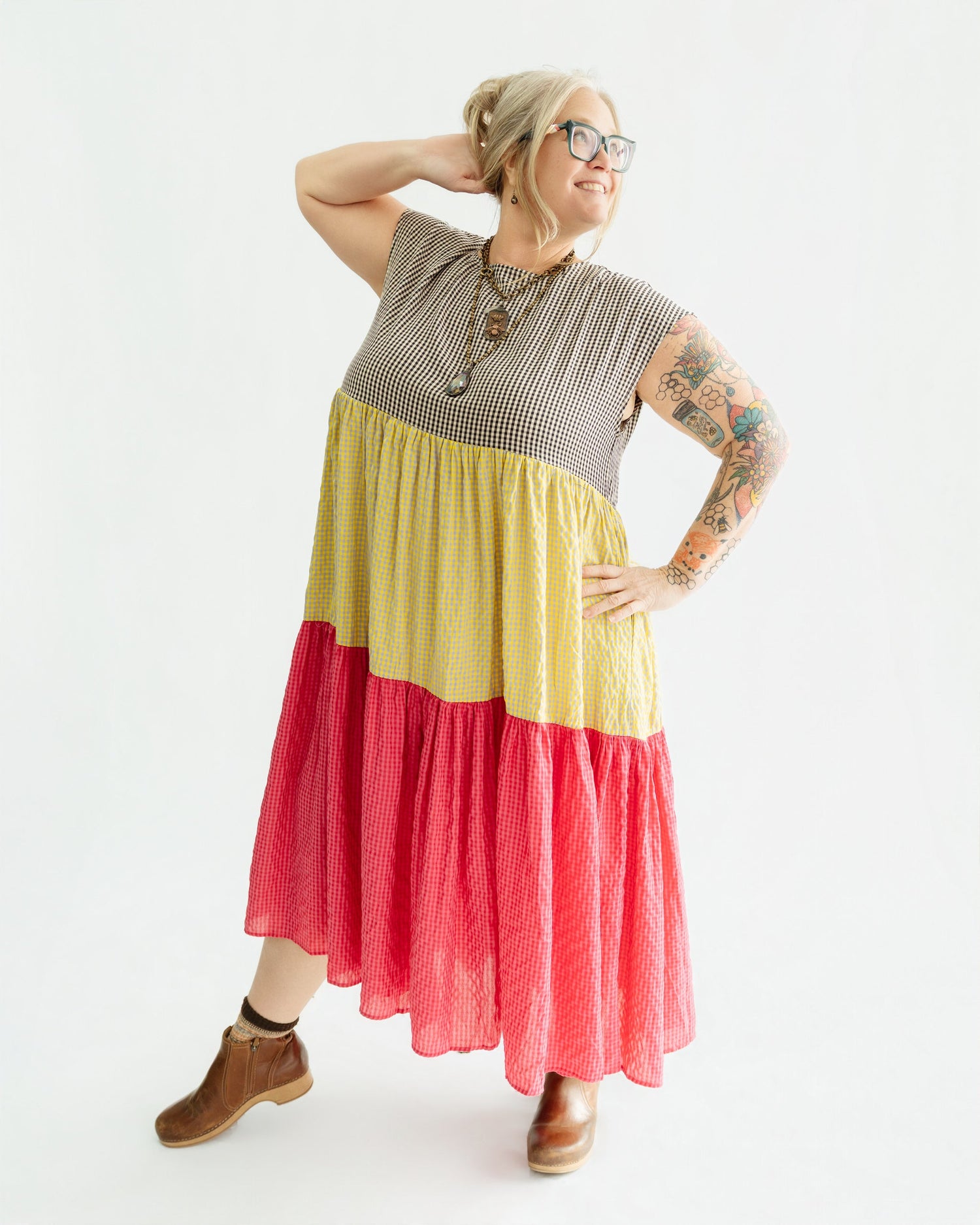 Plus size black floral maxi dress with long sleeves and smocked waist at Harlow + James boutique in West Des Moines Iowa, sizes 1X-4X