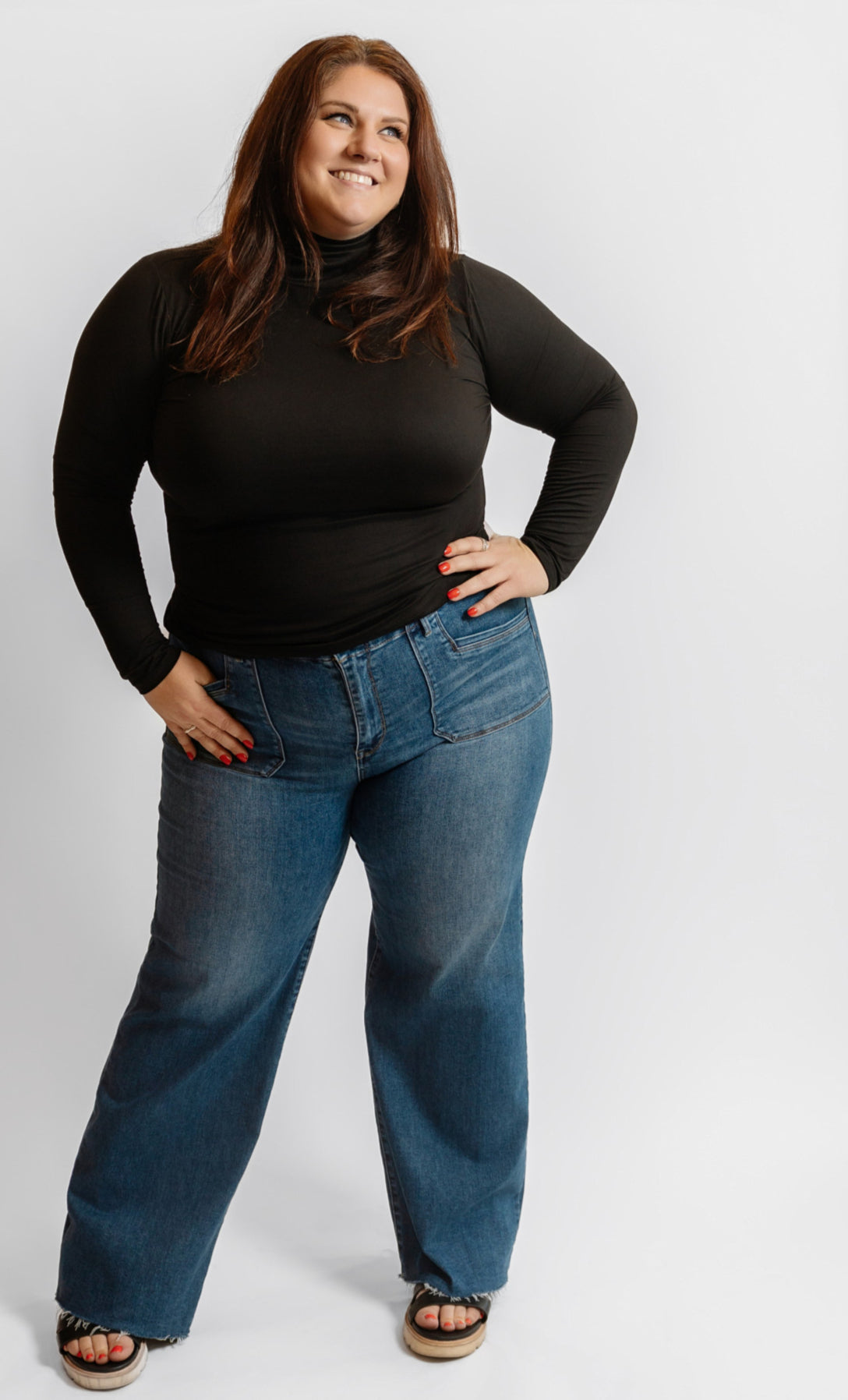 Plus size wide leg denim jeans with black turtleneck casual outfit Harlow + James West Des Moines Iowa
